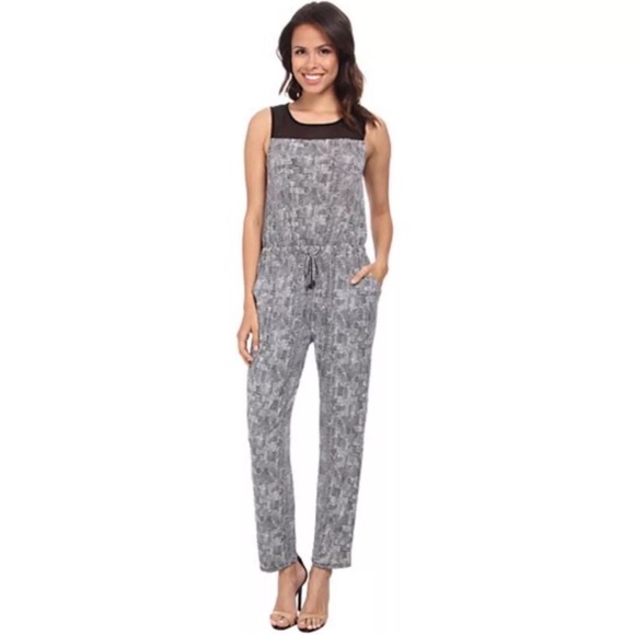 VINCE CAMUTO Sleeveless Scale
Stretchy Imprint Jumpsuit - Picture 1 of 14